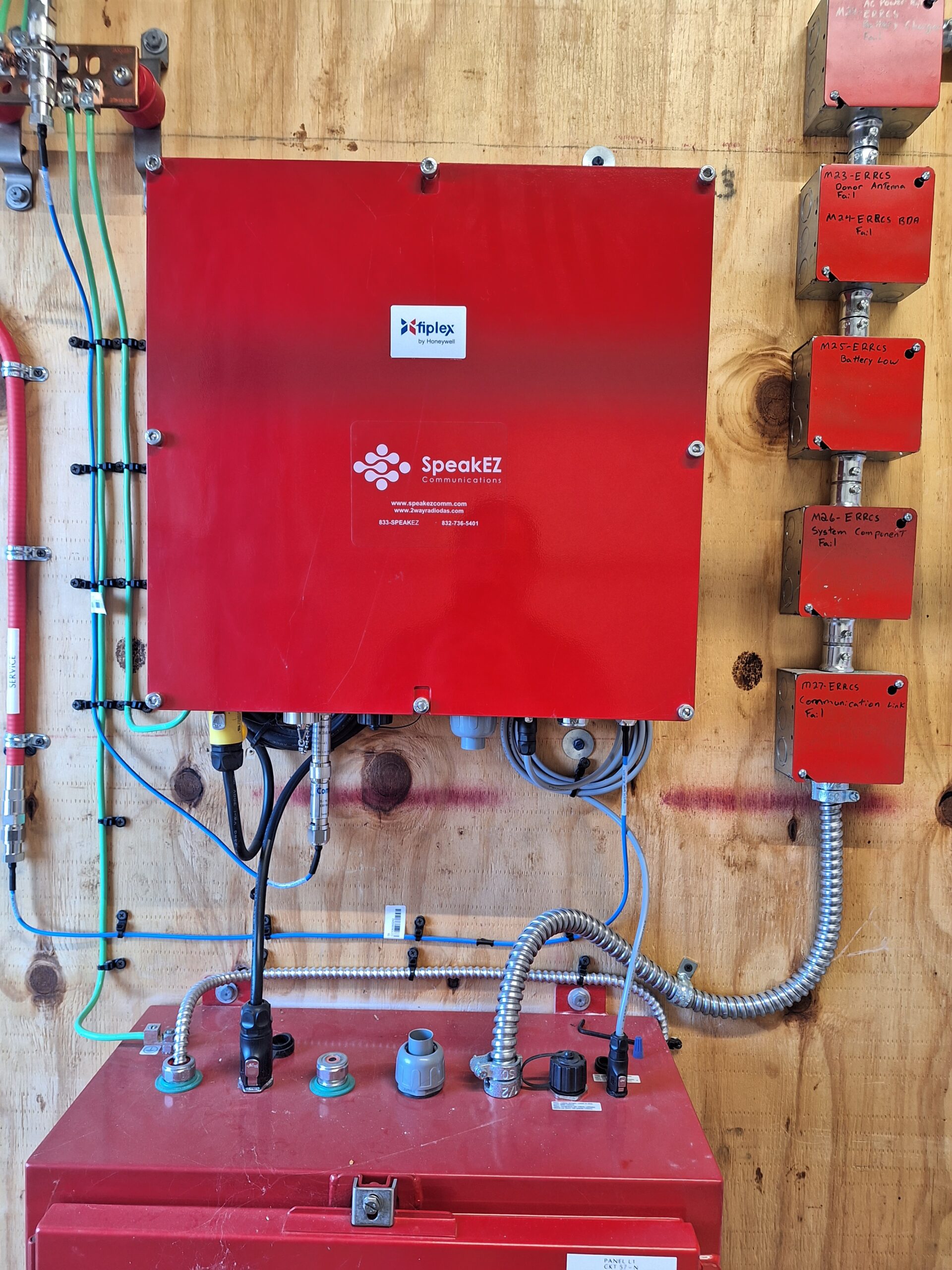 A close-up view of a commercial fire alarm panel. Austin property managers must adhere to strict NFPA 72 requirements, including annual inspections by a licensed technician and regular communication pathway testing, to avoid city fire code violations.