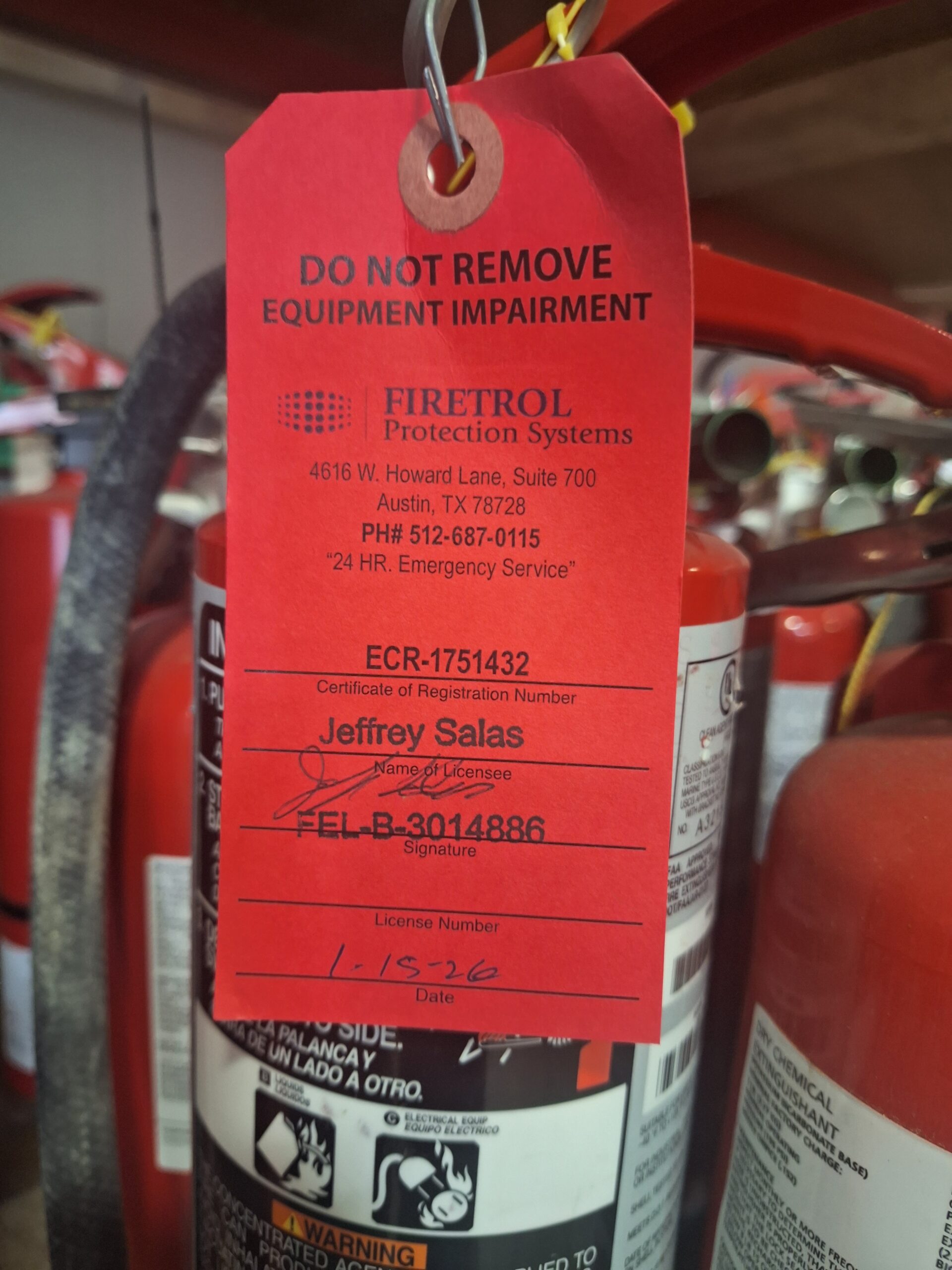 A licensed fire protection technician must inspect the pressure gauge of a commercial fire extinguisher in Texas.